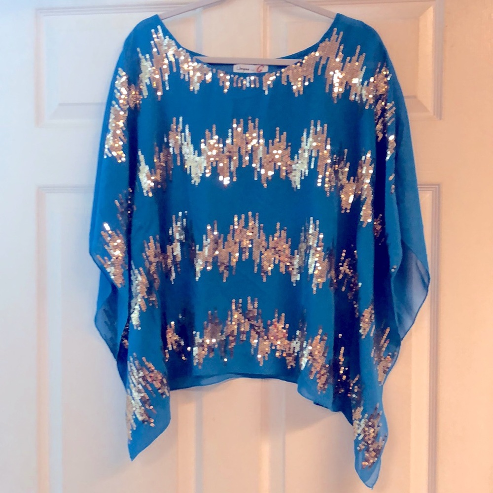 Umgee butterfly metallic gold.  Size medium.